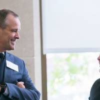 Two guests talking to each other.